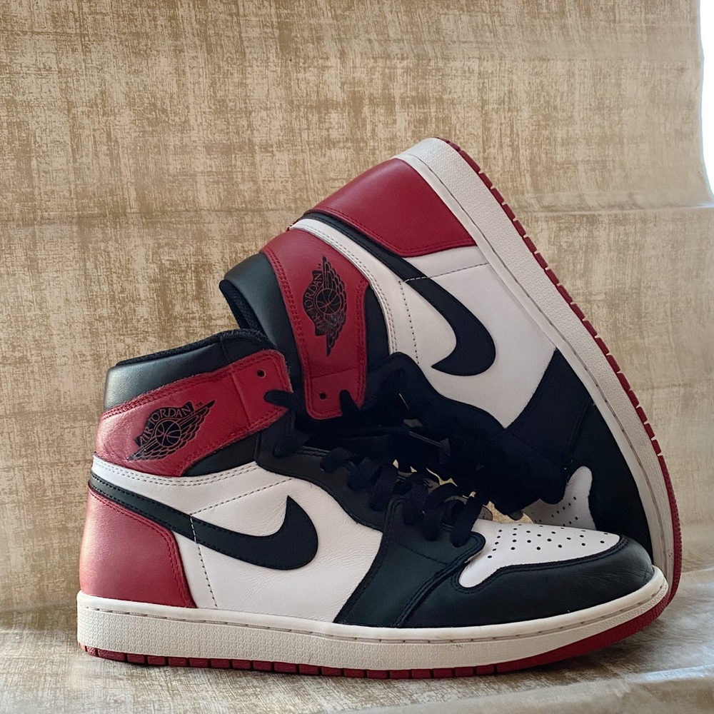 Jordan high black toe 1’s.